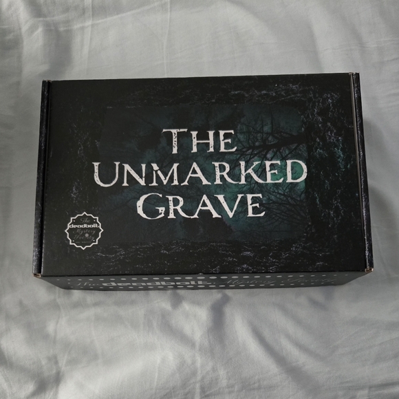 Deadbolt Mystery Society Unmarked Grave Murder Mystery - Picture 1 of 1